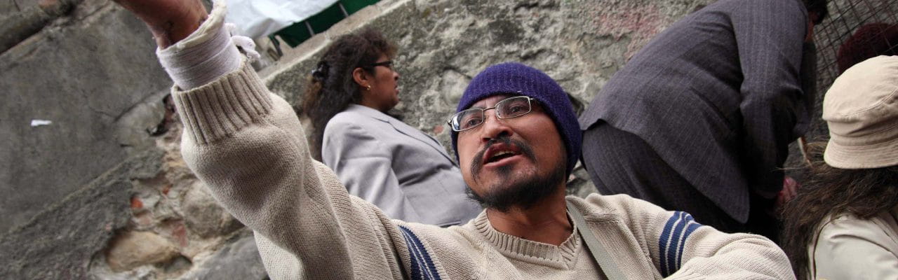 The photo of that man in the wheel chair was taken during one of the HUGE protests that disability groups hold annually to try to force the government to give them more money becuase they can't work. The city streets are shut down and the riot police come out and tear gas everyone.